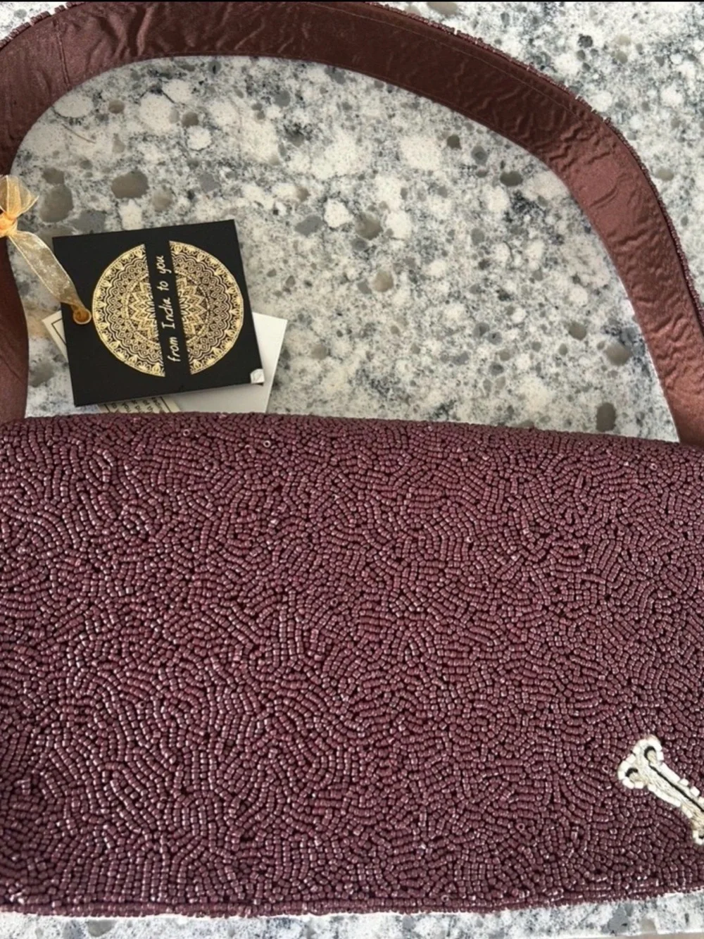 Beaded bag with dogs and bone charms